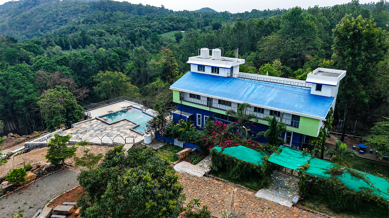 Blue Hill Lotus luxury wellness resort entrance in Sirumalai Hills Tamil Nadu